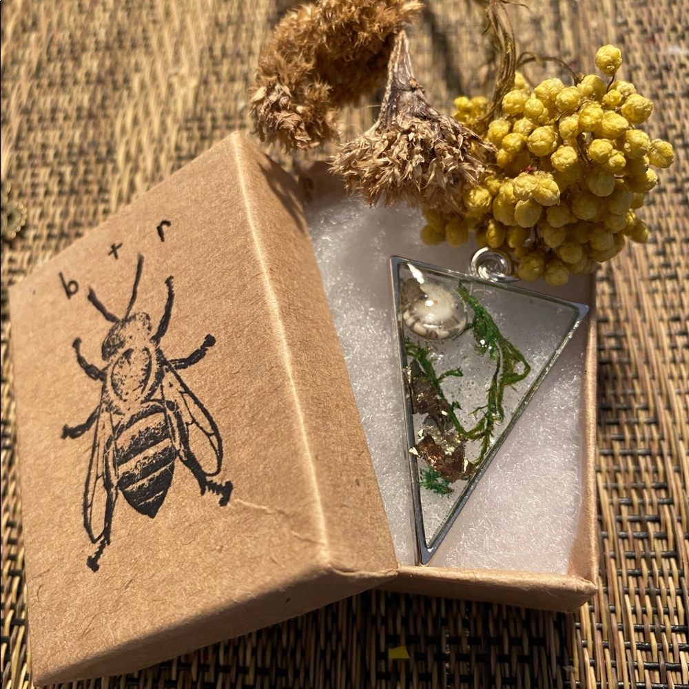 Suspended Life Elongated Triangle Pendants